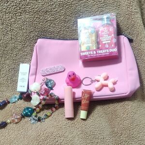 Mally Cosmetic Bag Filled With Hempz Sweets Moisturizer, And Other Treats.